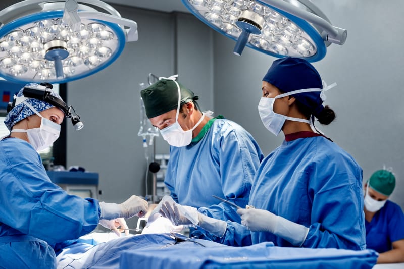 An operating room and staff.