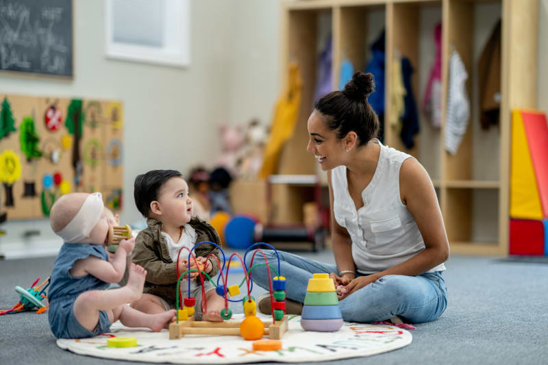Babies playing at childcare facility.