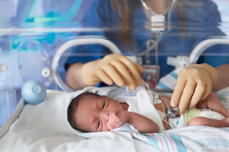 A newborn in the Neonatal Intensive Care Unit at the hospital.